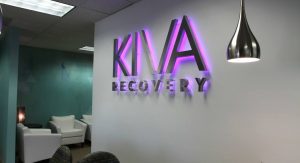 KIVA backlit stainless lighted lobby business sign